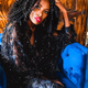 Designer Andrea Pitter Campbell in her own design, the fringed button-up and pants.